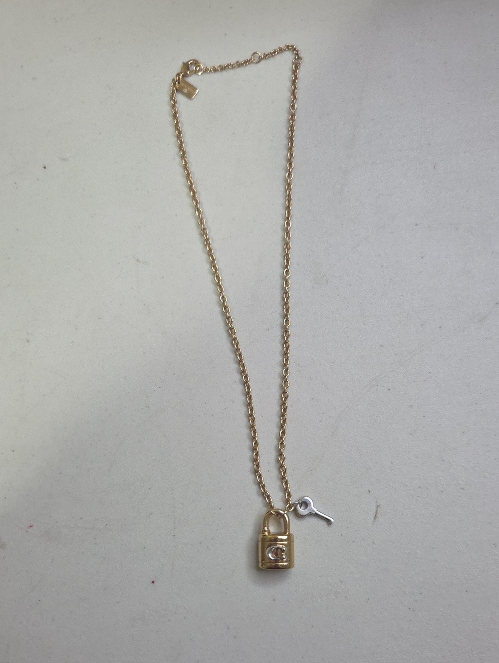 Coach Gold Padlock Pendant Necklace with Key